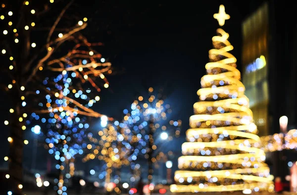 圣诞装饰背景与金色和蓝色的灯光发光 — 图库照片