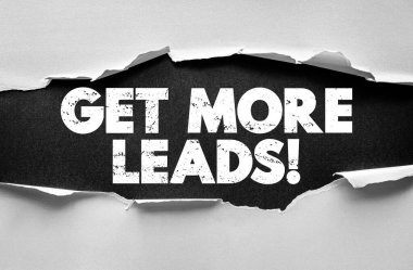 GET MORE LEADS! bold cracked font on ripped paper background. Concept for sales, marketing, customer acquisition, business growth, and revenue generation