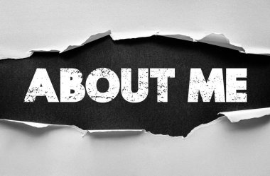 ABOUT ME phrase in bold distressed letters revealed under torn paper design. Concept for personal introduction, biography, self-presentation, portfolio or business profile