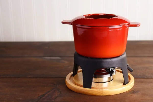Red Cast Iron Fondue Pot — Stock Photo, Image