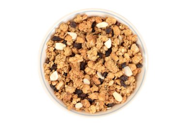 üstten görünüm kase granola kuru üzüm badem tahıl