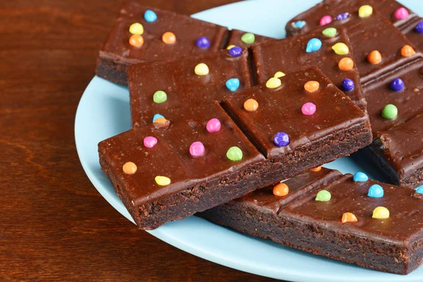 Closeup Chocolate Fudge Brownies Candy Pieces Blue Plate — Stock Photo, Image