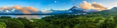 Panoramic view of Arenal Volcano and lake in central Costa Rica clipart