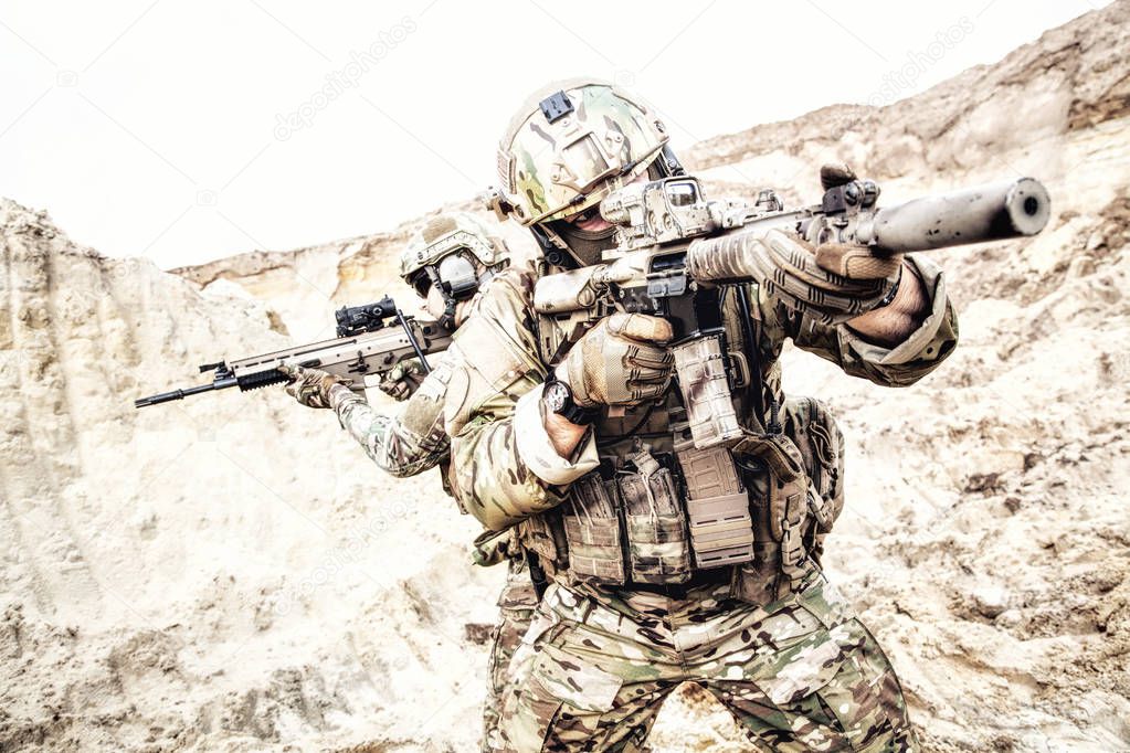 Commandos searching and attacking enemy in desert