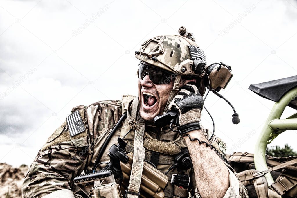 Soldier communicating with command during battle