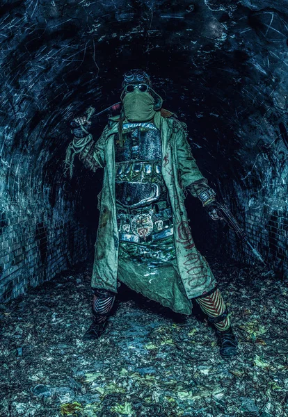 Post apocalyptic survivor in abandoned tunnel — Stock Photo, Image