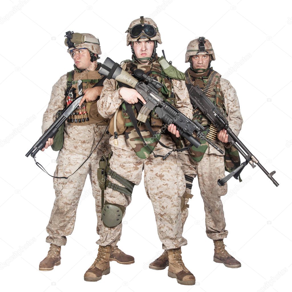 Three equipped and armed U.S. marines studio shoot