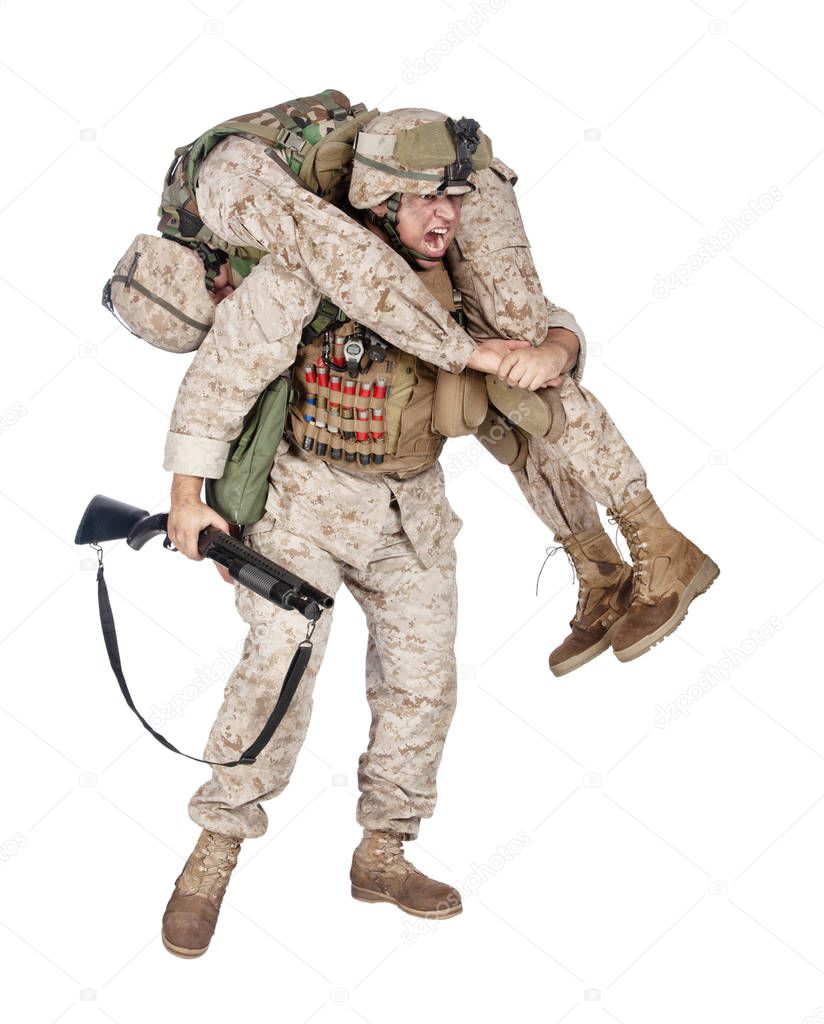 Marine infantry rescuing casualty soldier during battle