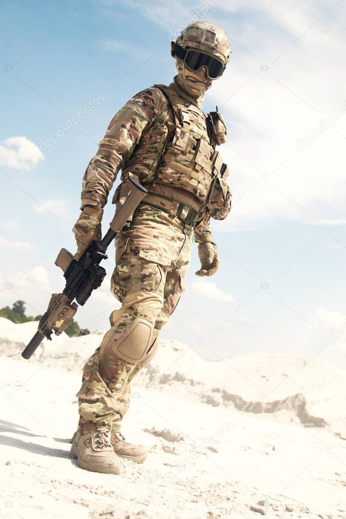 War games player equipped with tactical ammunition