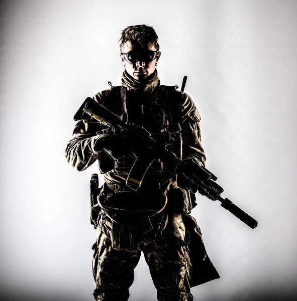 Military company mercenary low key studio portrait