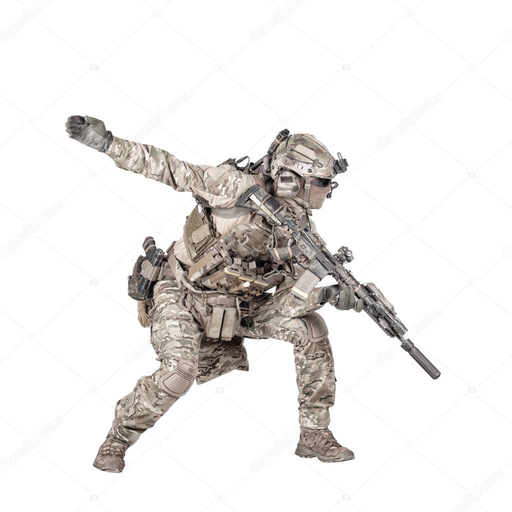 Army soldier going in attack isolated studio shoot