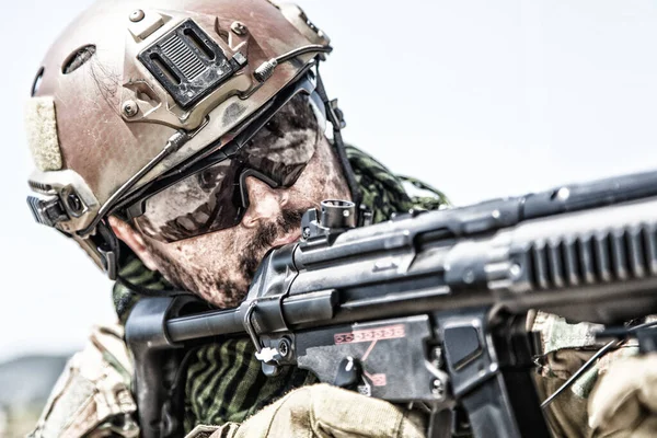 Commando fighter shooting with submachine gun — Stock Photo, Image