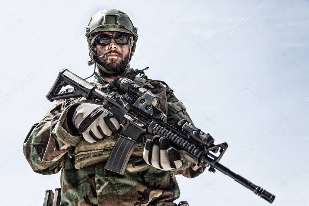 Private military company mercenary with gun