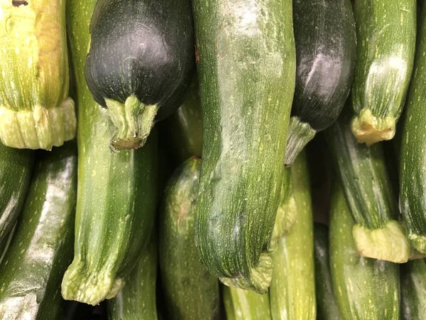 green zucchini harvest, healthy nutritious vegetable ingredient for cooking recipes, diet food that is fresh and raw