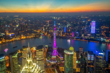 Aerial view of shanghai by the sunset in china clipart