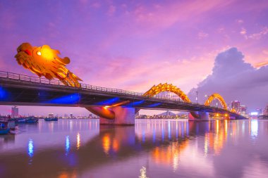 Dragon Bridge in Da Nang, vietnam at night clipart