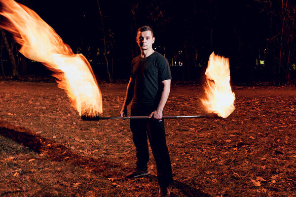 Fire show. Fire performance at the night.