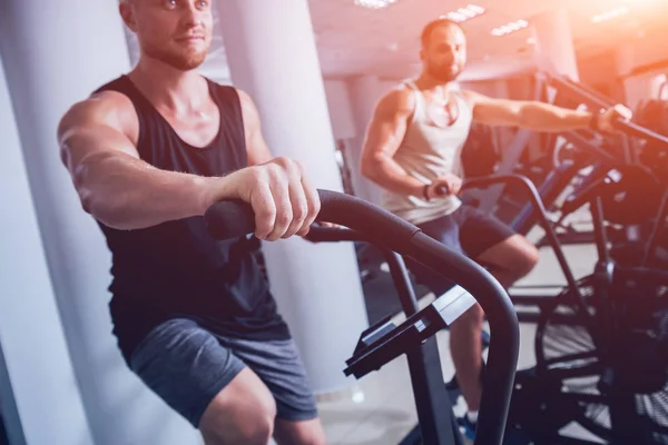 Young Men Muscular Body Using Air Bike Cardio Workout Cross — Stock Photo, Image