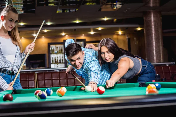 Group Young Cheerful Friends Playing Billiards Funny Time Work — ストック写真