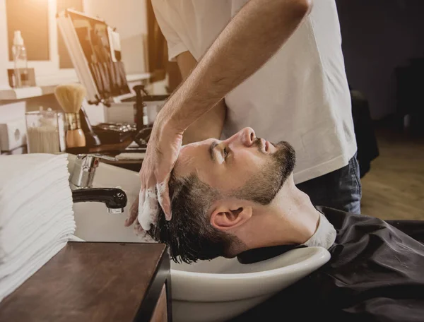 Young Man Trendy Haircut Barber Shop Barber Washes Customer Head — Stock Photo, Image