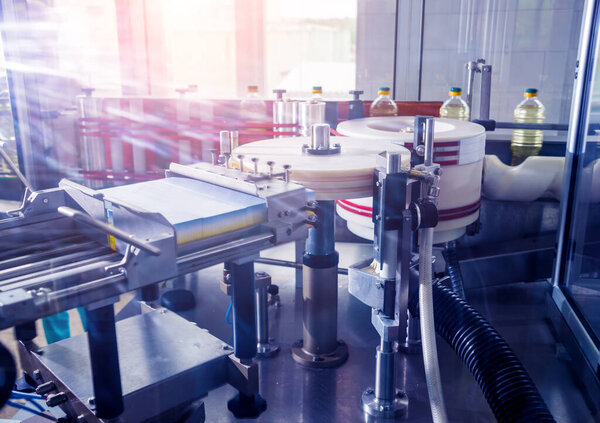 Automatic labeling machine during operation, industry background