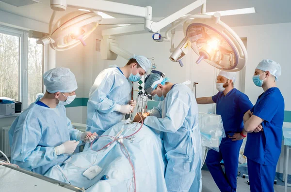 Spinal surgery. Group of surgeons in operating room with surgery equipment. Laminectomy — 스톡 사진