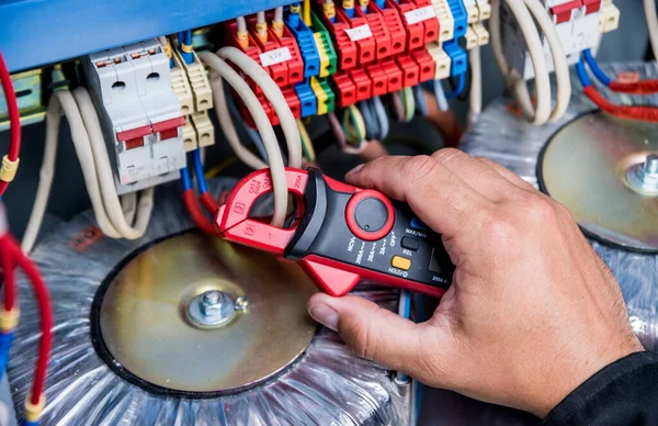 close up of electrical measurements with multimeter tester