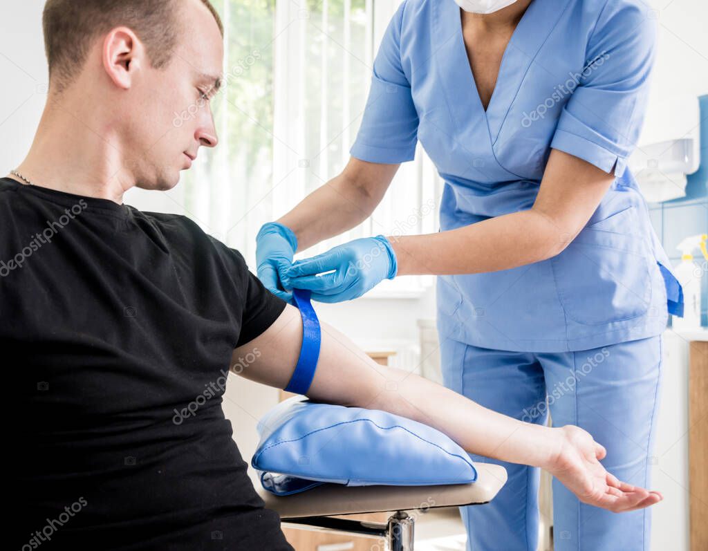 Nurse taking blood sample. Medical equipment. Blood test