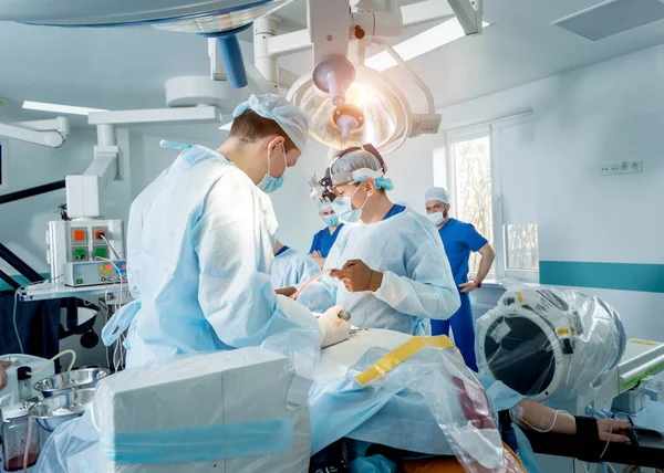 Spinal surgery. Group of surgeons in operating room with surgery equipment. Laminectomy — 스톡 사진