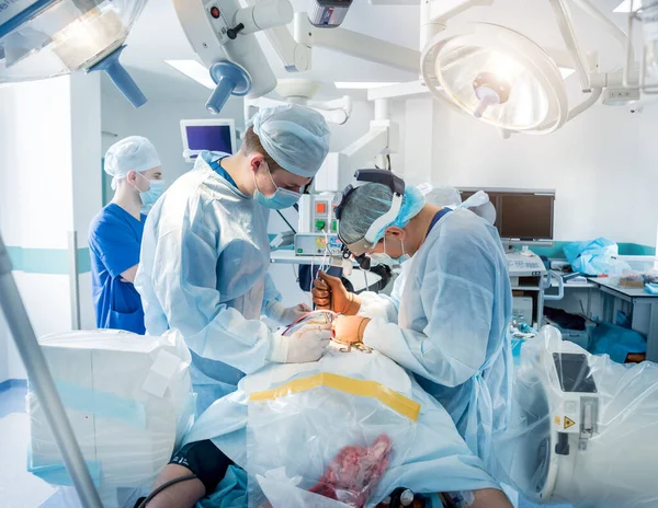 Spinal surgery. Group of surgeons in operating room with surgery equipment. Laminectomy — 스톡 사진