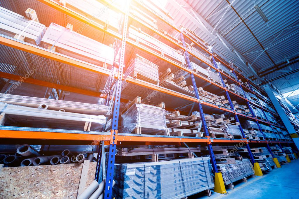 Warehouse industrial company, crates stacked on shelves