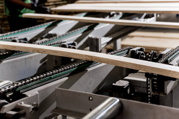 Production line of wooden floor factory, industrial background