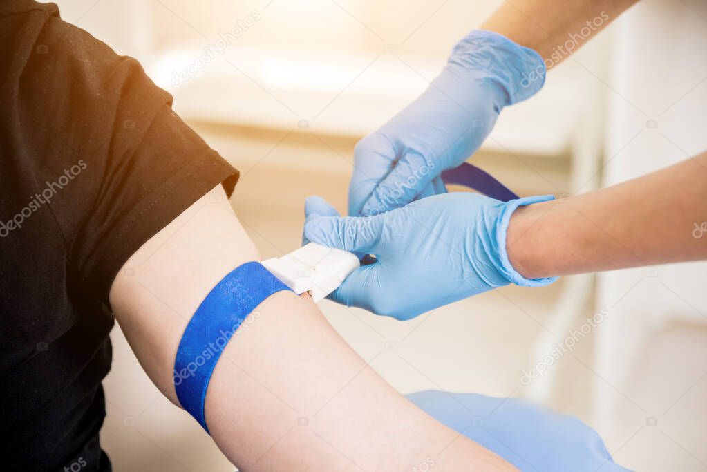 Nurse taking blood sample. Medical equipment. Blood test