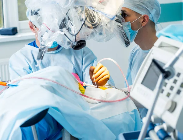 Brain surgery. Group of surgeons in operating room with surgery equipment. — Stock Photo, Image