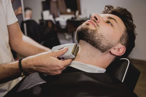 Young Man Trendy Haircut Barber Shop Barber Does Hairstyle Beard — Stock Photo, Image