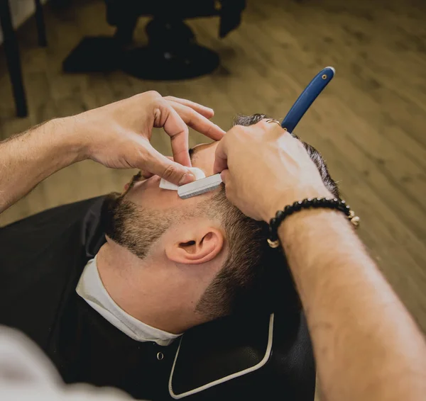 Young Man Trendy Haircut Barber Shop Barber Does Hairstyle Beard — Stock Photo, Image