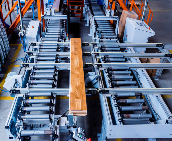 Production line of wooden floor factory, industrial background