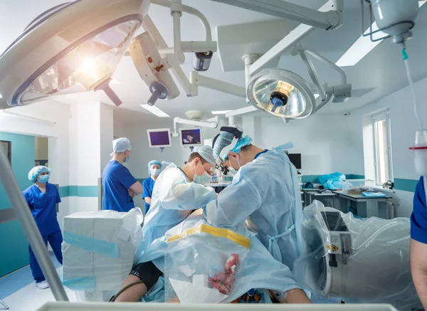 Spinal surgery. Group of surgeons in operating room with surgery equipment. Laminectomy — 스톡 사진