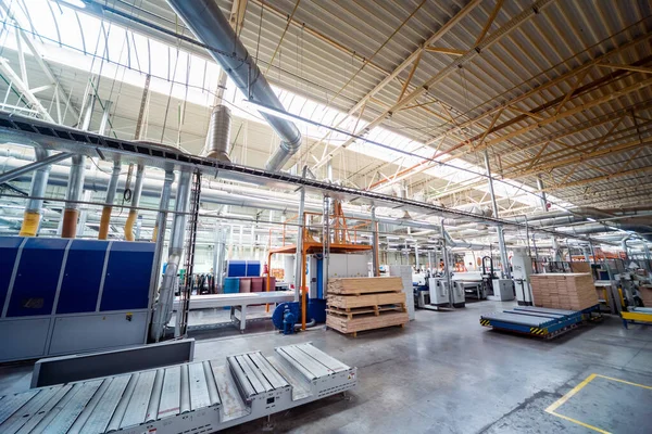 Production line of wooden floor factory, industrial background