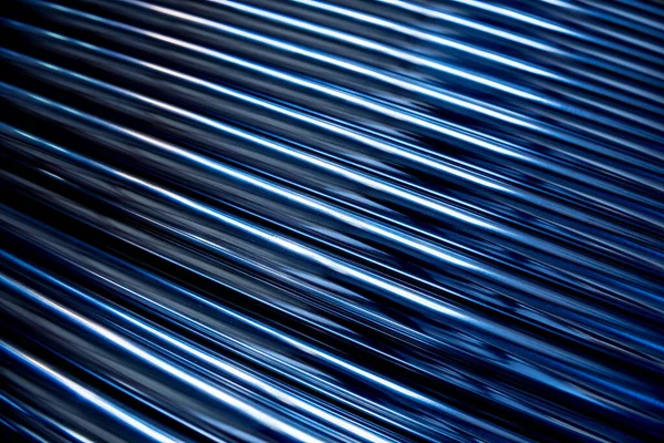 Fundo abstrato de tubos de aço empilhados em uma palete — Fotografia de Stock