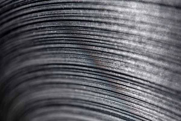 Curved lines of rolled metal are made of sheet steel.
