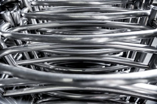 Metal boru inşaatının endüstriyel arka planı.