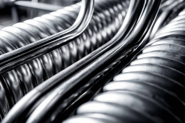 Contexte industriel abstrait de la construction de tuyaux métalliques. — Photo