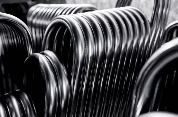 Abstract industrial background of metal pipes construction.