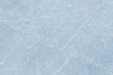 Buz pateni ve hokey işaretleri ile arka plan. Buz hokeyi pateni pisti çizikler yüzey