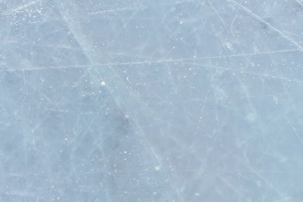 冰的背景与分数从滑冰和曲棍球 冰球溜冰场划痕表面 — 图库照片