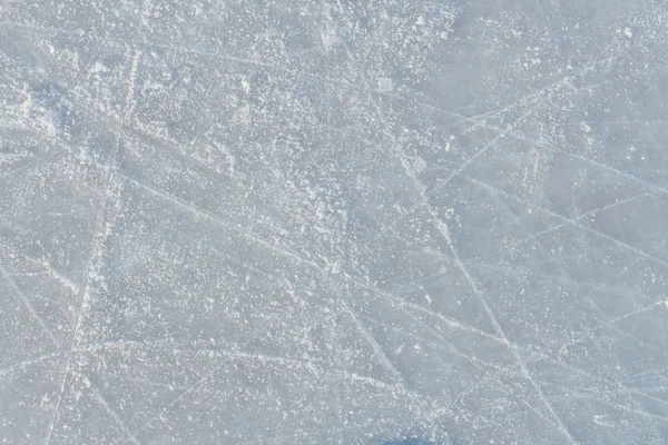 冰的背景与分数从滑冰和曲棍球 冰球溜冰场划痕表面 图库图片