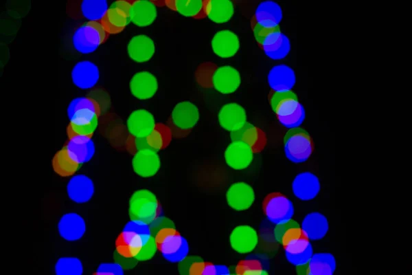 Bokeh azzurrato astratto colorato da luci di notte — Foto Stock