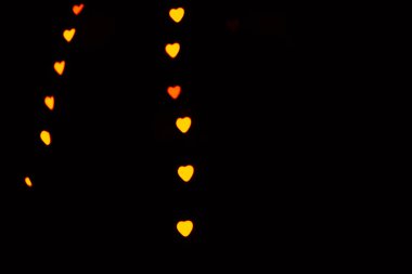 Renkli soyut kalp şekli mevsimlik bokeh geceleri