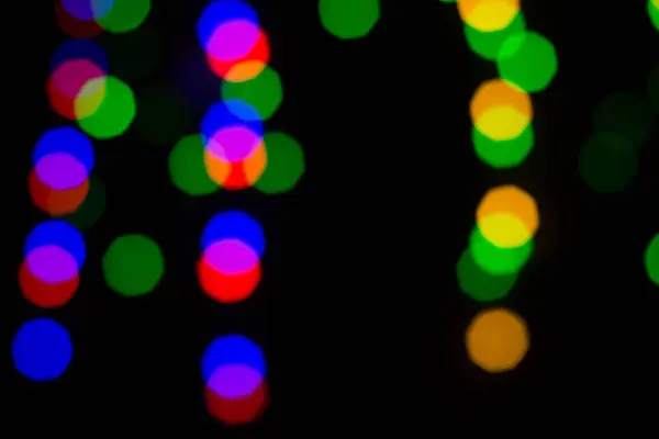 Kleurrijke abstracte blured bokeh van lichten 's nachts — Stockfoto